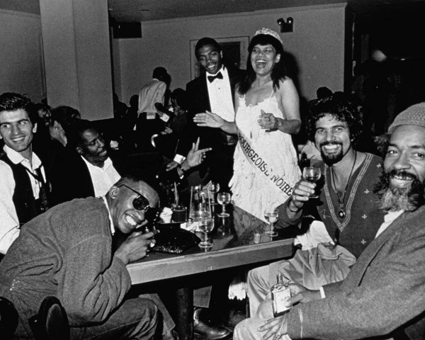 Mlle Bourgeoise Noire celebrates with her friends. Mlle Bourgeoise Noire performance by Lorraine O'Grady.