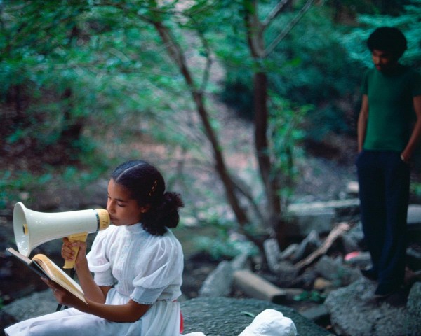 The Young Man in Green enters the scene, performance Rivers First Draft by Lorraine O’Grady.