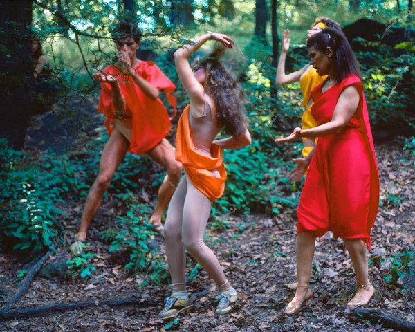 The Debauchees dance in place, and the Woman in Red catches up to them, performance Rivers First Draft by Lorraine O’Grady.