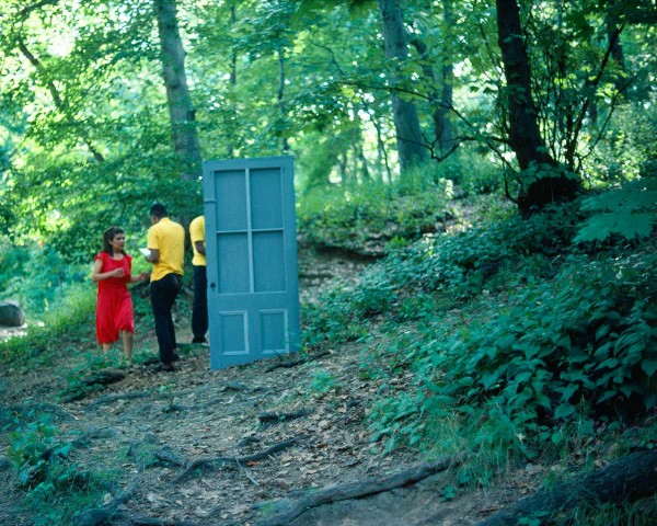 The Woman in Red tries to join the Black Male Artists but is ejected by them, performance Rivers First Draft by Lorraine O’Grady.