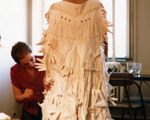 1980, Ellen Rosen helps Mlle Bourgeoise Noire dress for performance at Just Above Midtown Gallery, NY.